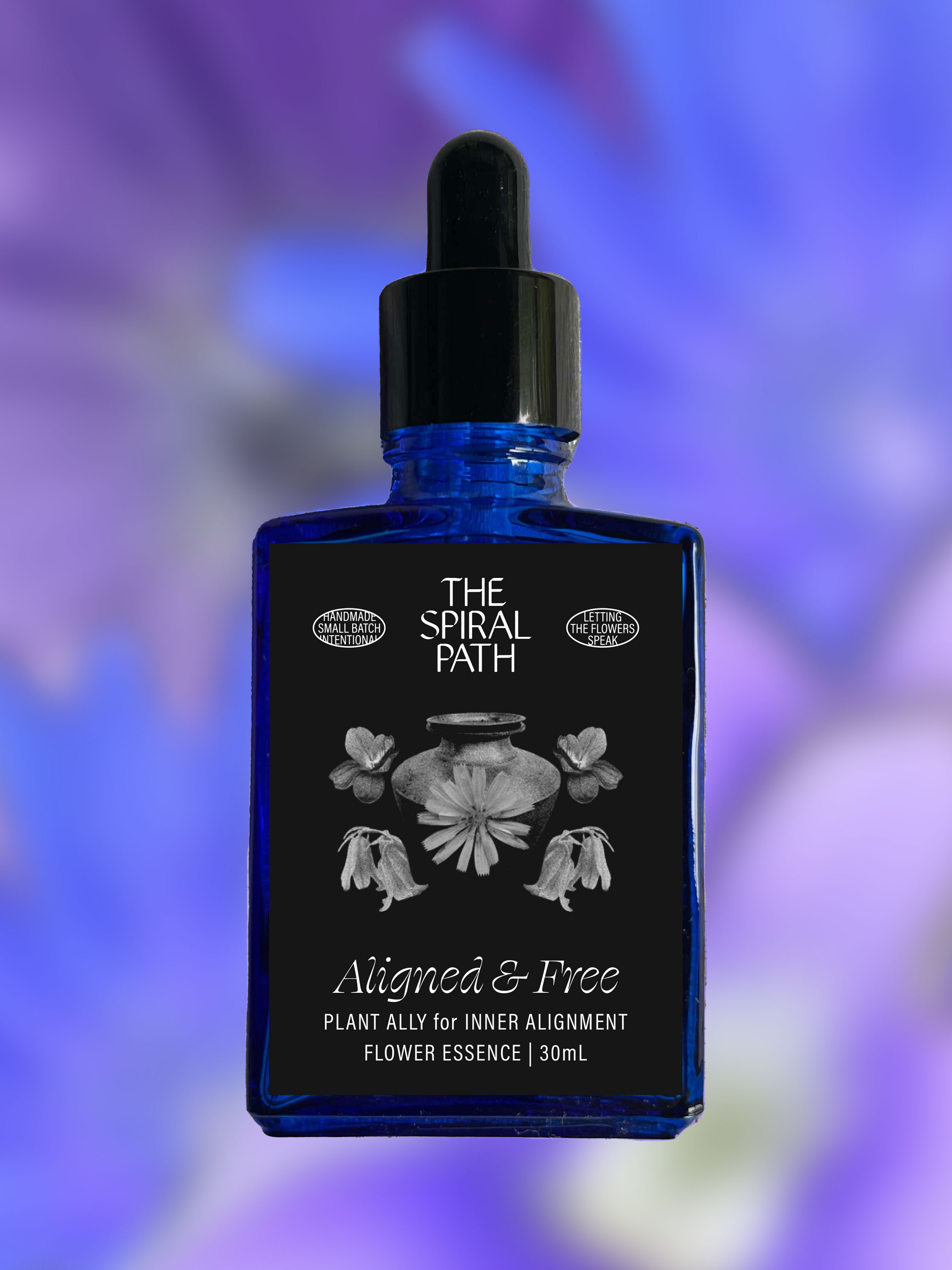 Small batch organic flower essence - feminine healing, 15mL, blue glass bottle with dropper. This essence supports emotional healing and is a sensitive medicine for sensitive people. Aligned & Free flower essence is a plant ally for inner alignment. Bellflower, Chicory, and Violet.