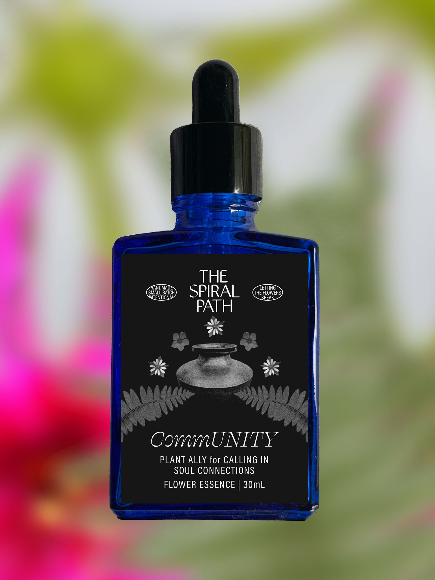 Small batch organic flower essence - feminine healing, 15mL, blue glass bottle with dropper. This essence supports emotional healing and is a sensitive medicine for sensitive people. Community flower essence is a plant ally for calling in soul connections. Fern, Chickweed, Phlox.