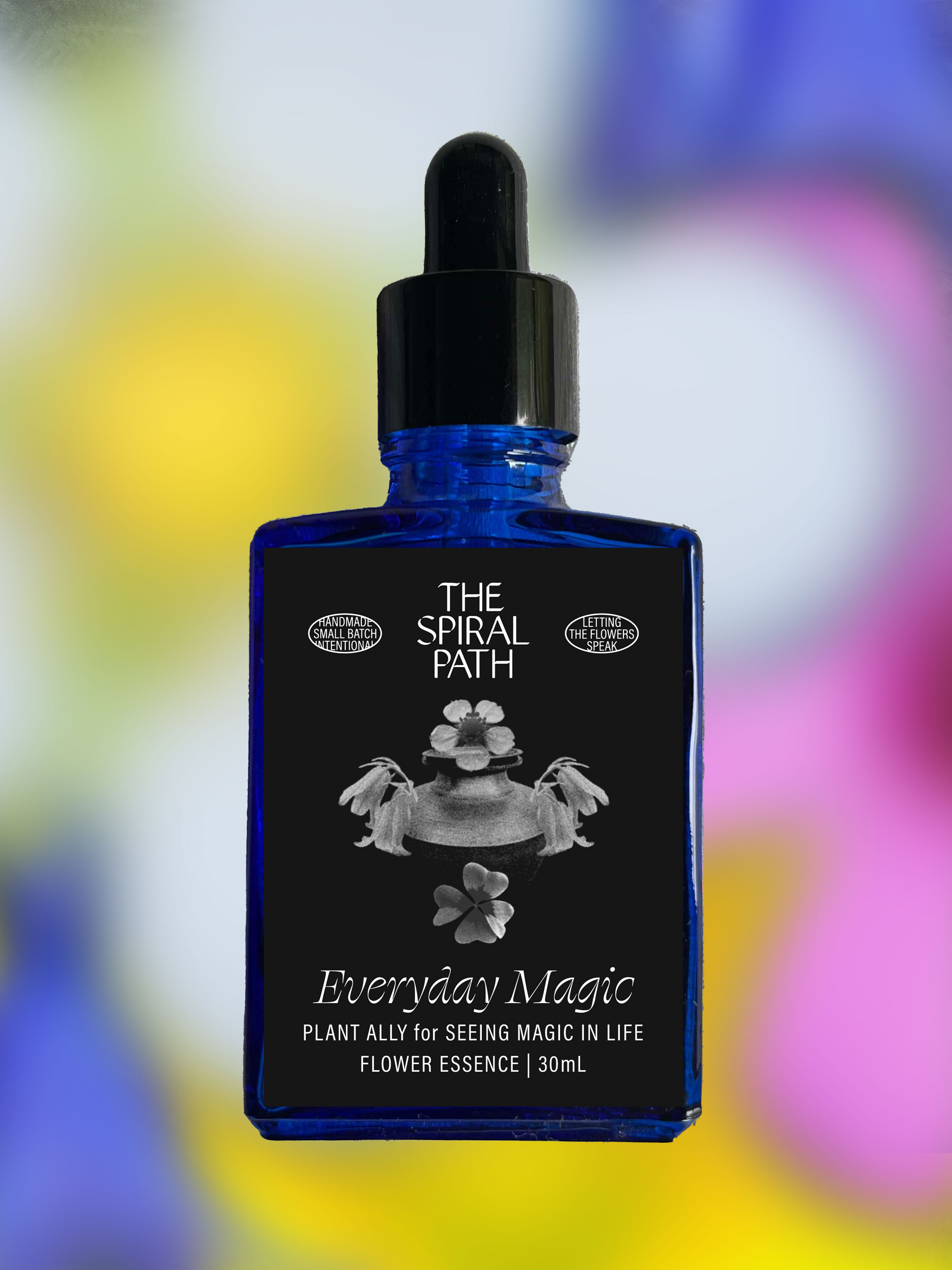 Small batch organic flower essence - feminine healing, 15mL, blue glass bottle with dropper. This essence supports emotional healing and is a sensitive medicine for sensitive people. Everyday Magic flower essence is a plant ally for seeing magic in life. Strawberry blossom, wood sorrel, and Bluebell.