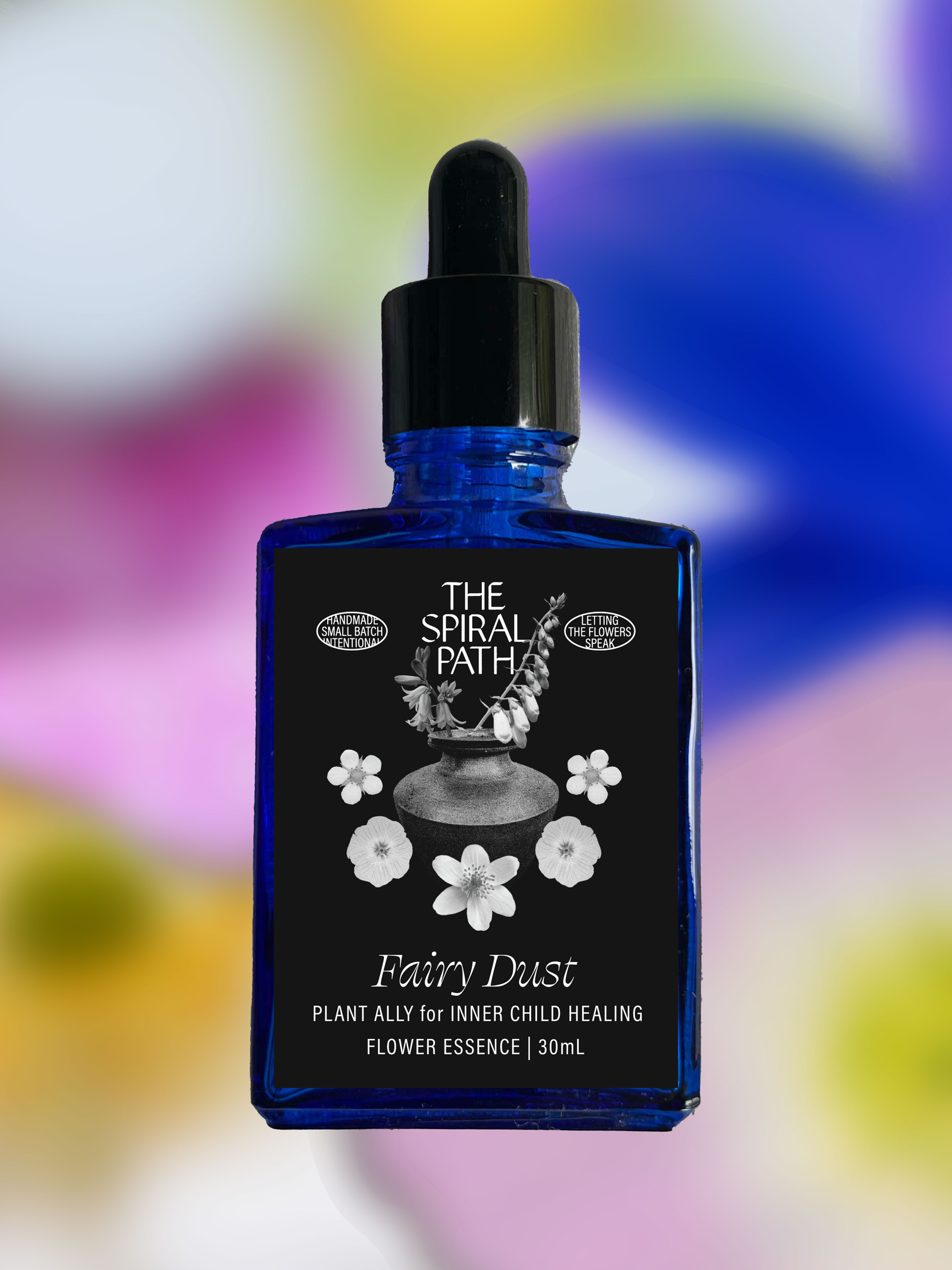 Small batch organic flower essence - feminine healing, 15mL, blue glass bottle with dropper. This essence supports emotional healing and is a sensitive medicine for sensitive people. Fairy Dust flower essence is a plant ally for inner child healing. Evening Primrose, Strawberry blossom, Anemone, Bluebells