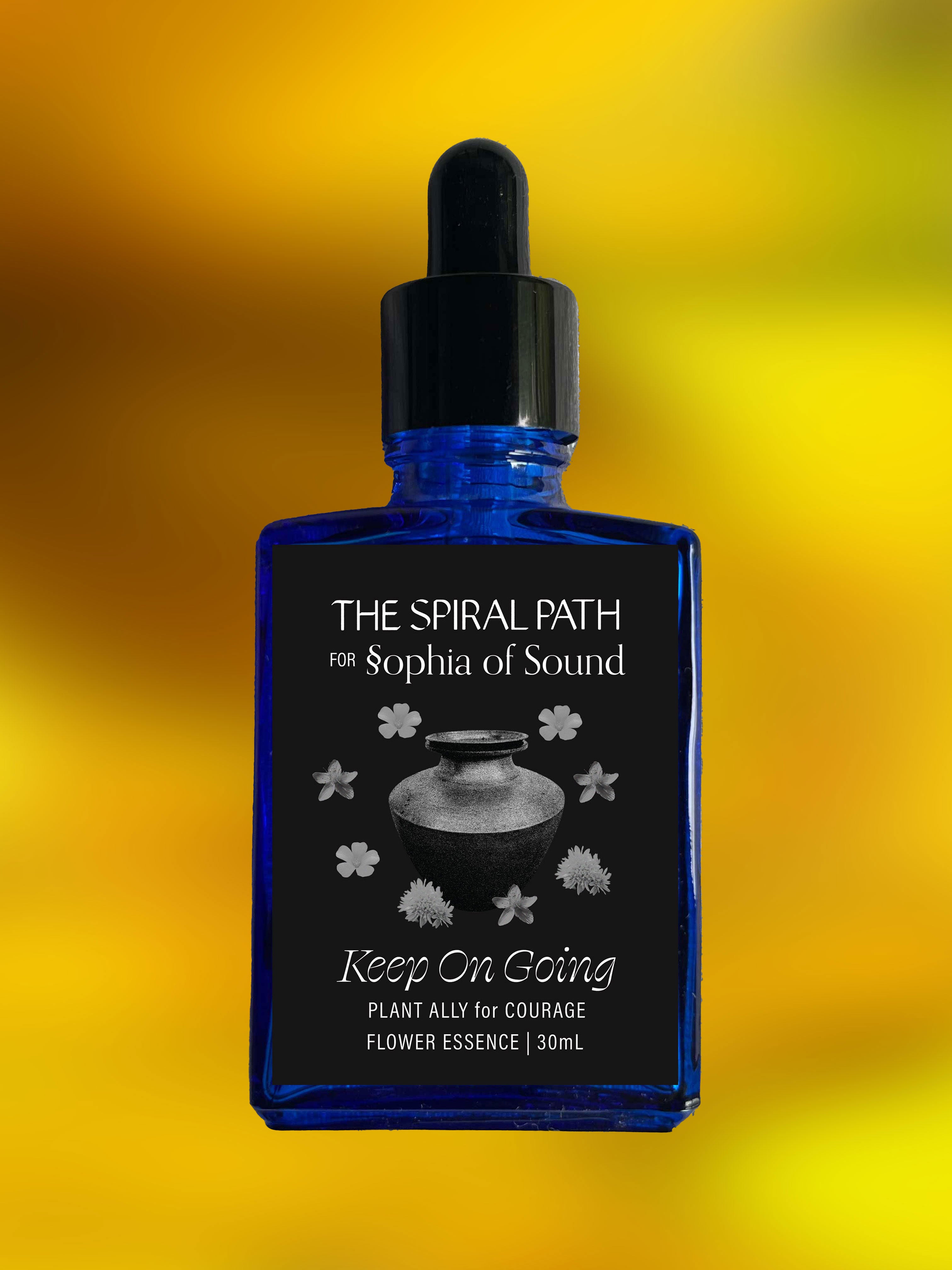 Small batch organic flower essence - feminine healing, 15mL, blue glass bottle with dropper. This essence supports emotional healing and is a sensitive medicine for sensitive people. Keep On Going flower essence is a plant ally for Courage. Saint John's Wort, Wood Sorrel, and Goldenrod.
