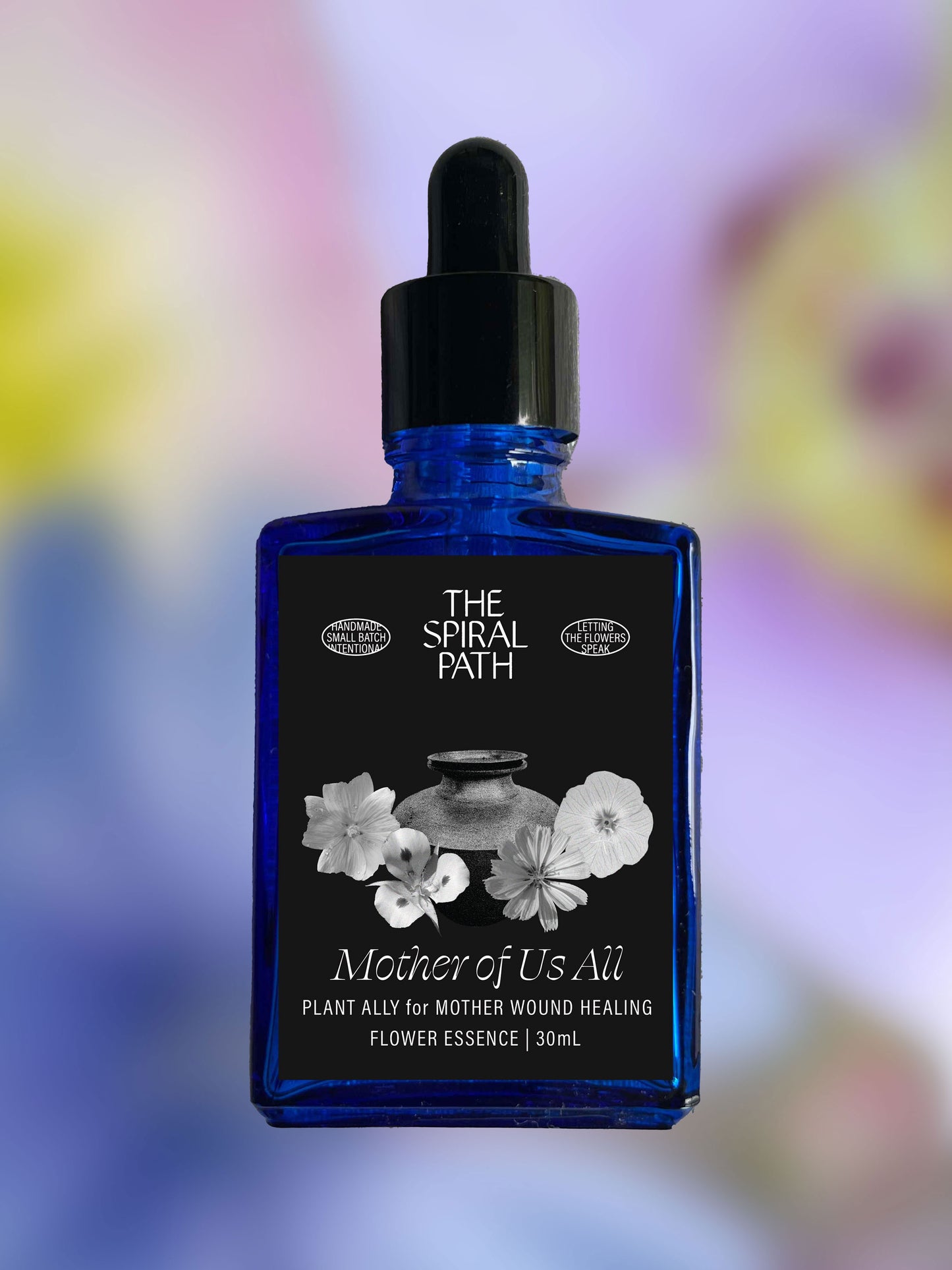 Small batch organic flower essence - feminine healing, 15mL, blue glass bottle with dropper. This essence supports emotional healing and is a sensitive medicine for sensitive people. Mother of Us All flower essence is a plant ally for Mother Wound Healing. Chicory, Evening Primrose, Mallow, Mariposa Lily.