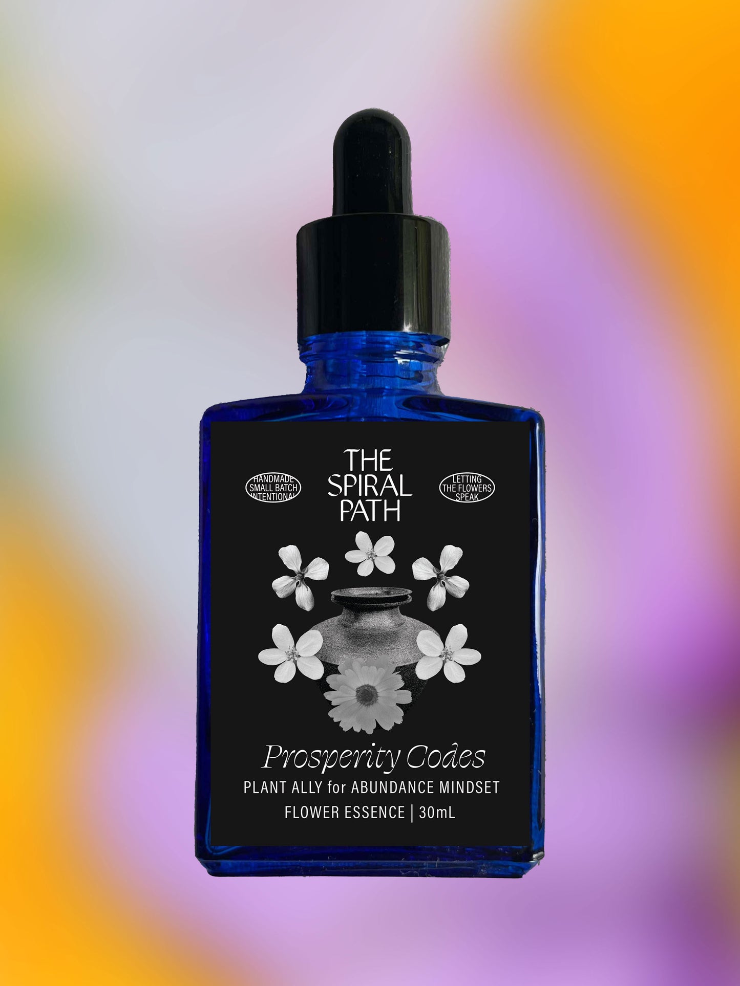 Small batch organic flower essence - feminine healing, 15mL, blue glass bottle with dropper. This essence supports emotional healing and is a sensitive medicine for sensitive people. Prosperity Codes flower essence is a plant ally for abundance mindset. Lunaria, Calendula, Apple Blossom.