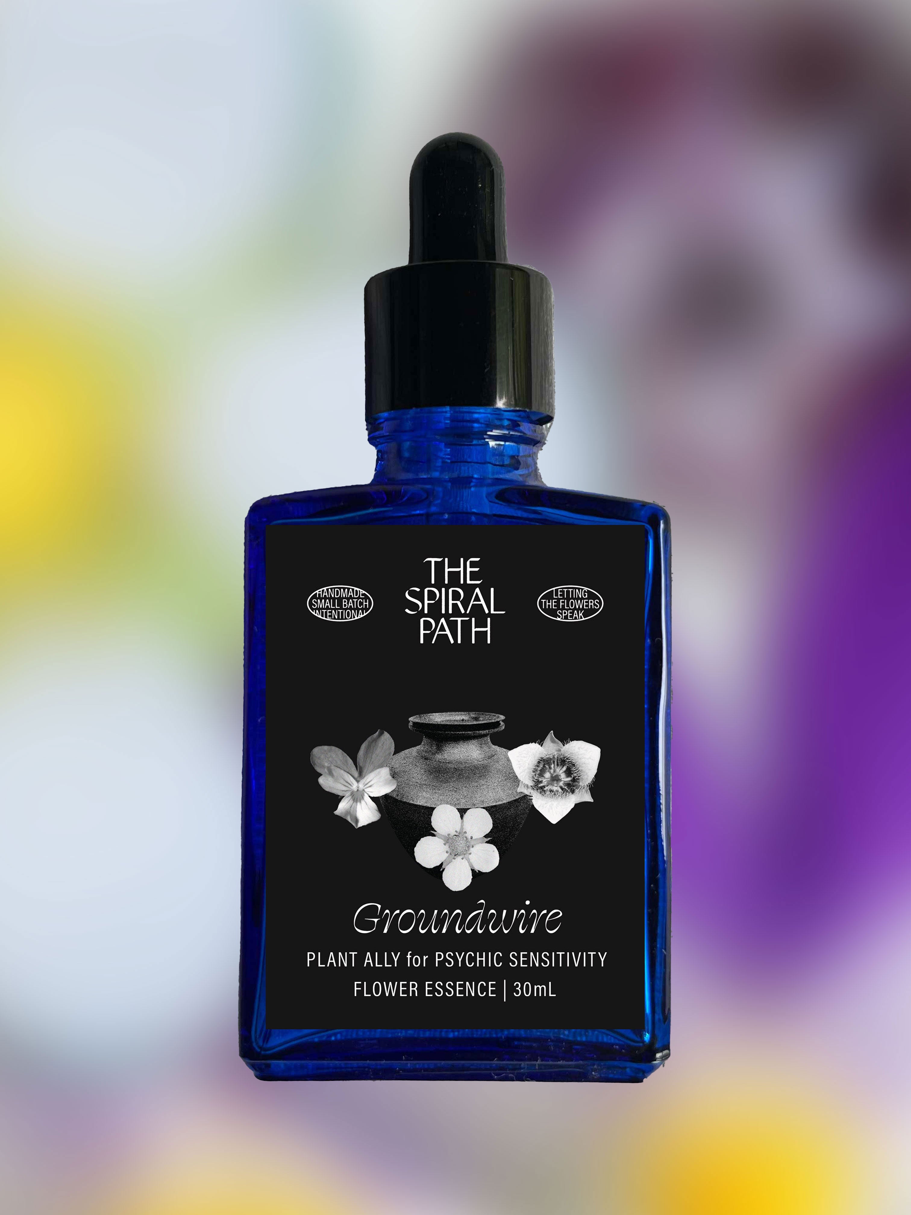 Small batch organic flower essence - feminine healing, 15mL, blue glass bottle with dropper. This essence supports emotional healing and is a sensitive medicine for sensitive people. Groundwire flower essence is a plant ally for psychic sensitivity. Star Tulip, Strawberry Blossom, Violet. 