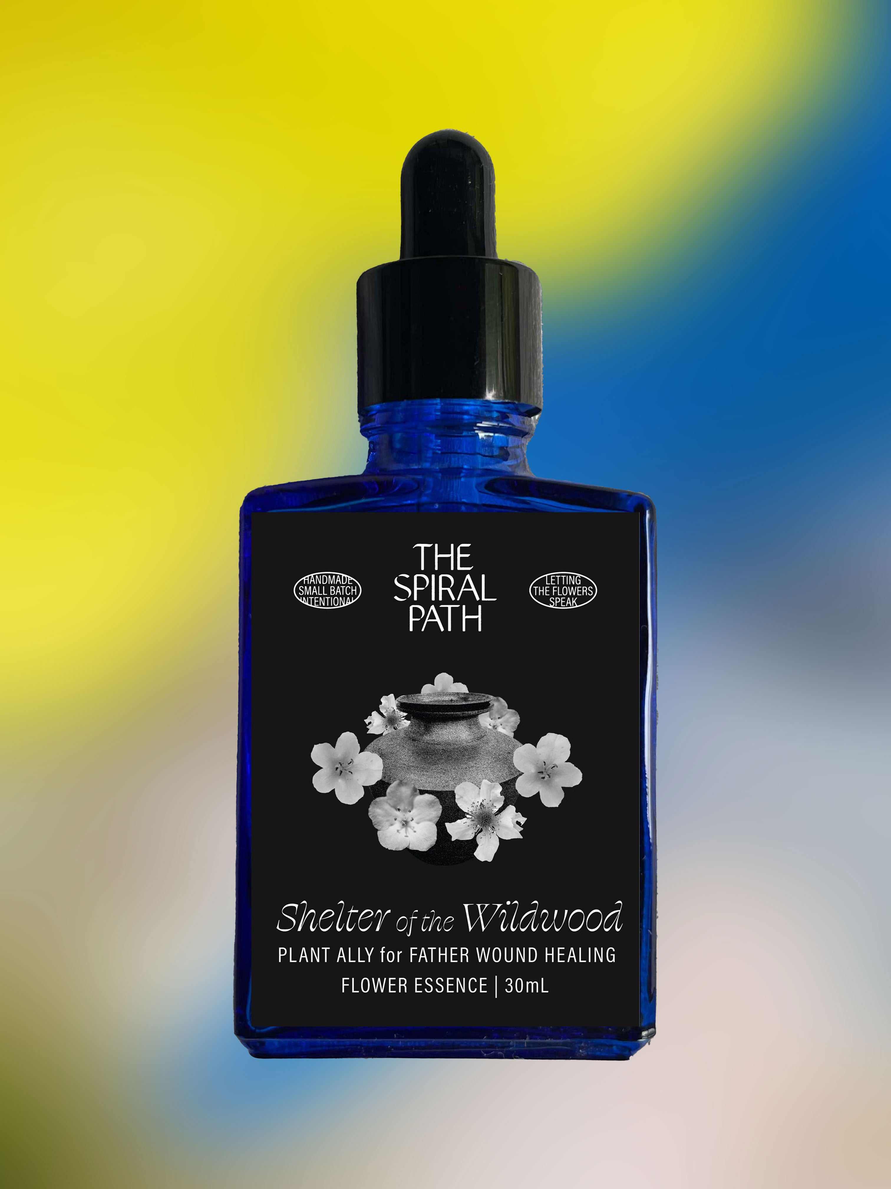 Small batch organic flower essence - feminine healing, 15mL, blue glass bottle with dropper. This essence supports emotional healing and is a sensitive medicine for sensitive people. Shelter of the Wildwood flower essence is a plant ally for Father wound healing. Baby Blue Eyes, Blackberry, and Mullein. 