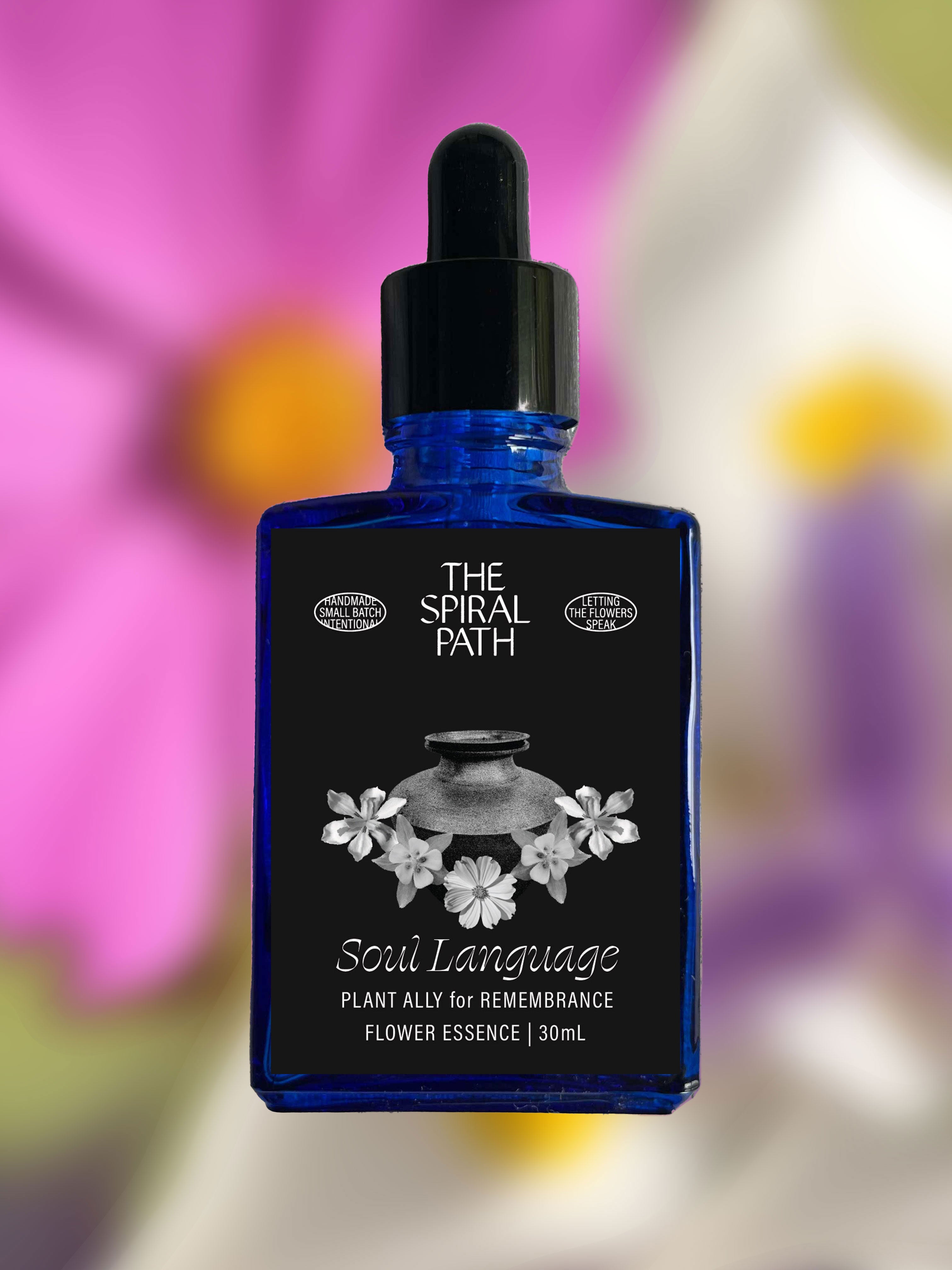 Small batch organic flower essence - feminine healing, 15mL, blue glass bottle with dropper. This essence supports emotional healing and is a sensitive medicine for sensitive people. Soul Language flower essence is a plant ally for remembrance. Cosmos, Columbine, Wild Iris. 